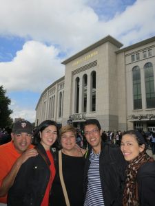The five siblings pose in front of the Yankee Stadium